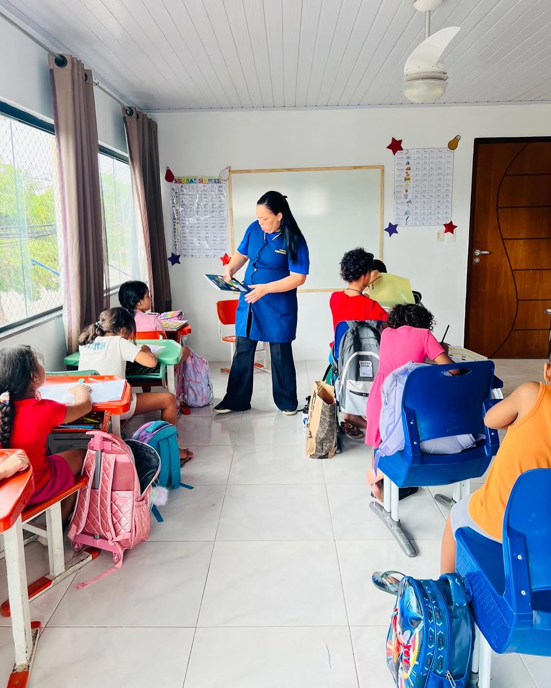 Criança participando de brincadeira em grupo na Creche Escola Florescer - Imagem 6